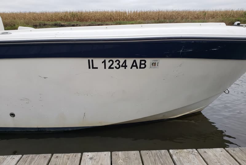 IL 1234 AB · 3" black on a light hull. What a Illinois number looks like on the bow.